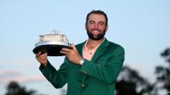 Scottie Scheffler celebrates winning the Masters in 2024